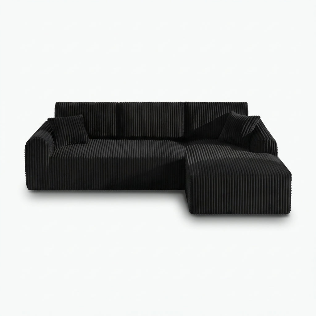 109-inch cloud modular sectional sofa with right-facing chaise in black — white front packshot