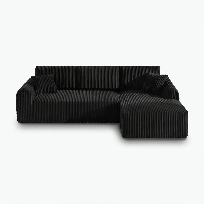 109-inch cloud modular sectional sofa with right-facing chaise in black — white front packshot