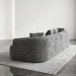 106-inch curved boneless modular sectional sofa in grey - grey form scene