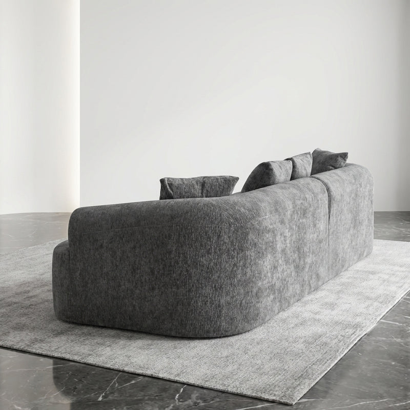 106-inch curved boneless modular sectional sofa in grey - grey form scene